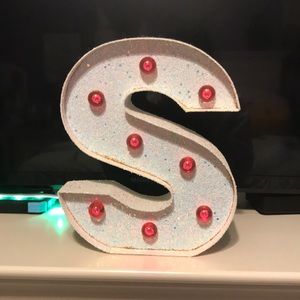 S shaped lamp from justice